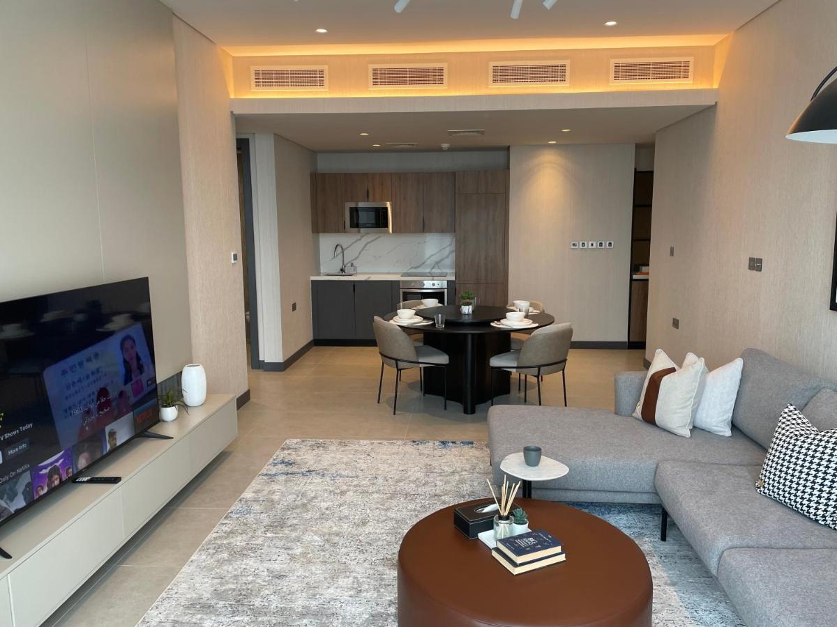 Charthouse Bahrain Hotel Al-Manamah Bagian luar foto A living room in a two-bedroom apartment