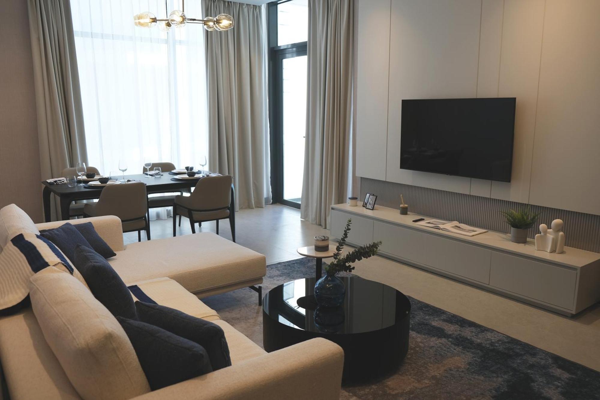 Charthouse Bahrain Hotel Al-Manamah Bagian luar foto A living room in a condominium