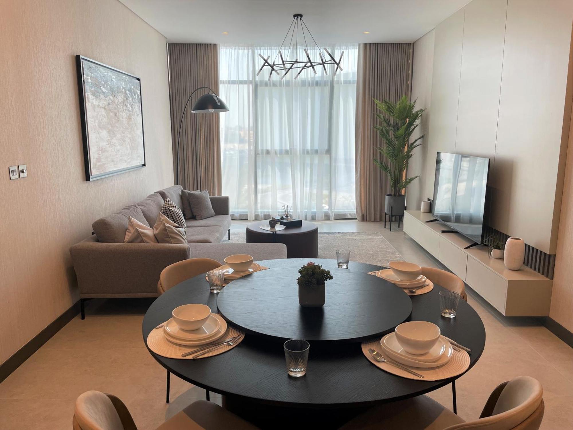 Charthouse Bahrain Hotel Al-Manamah Bagian luar foto A living room in a typical apartment